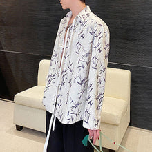 Load image into Gallery viewer, Casual Jacquard Lapel Button-down Long-sleeved Loose Shirt
